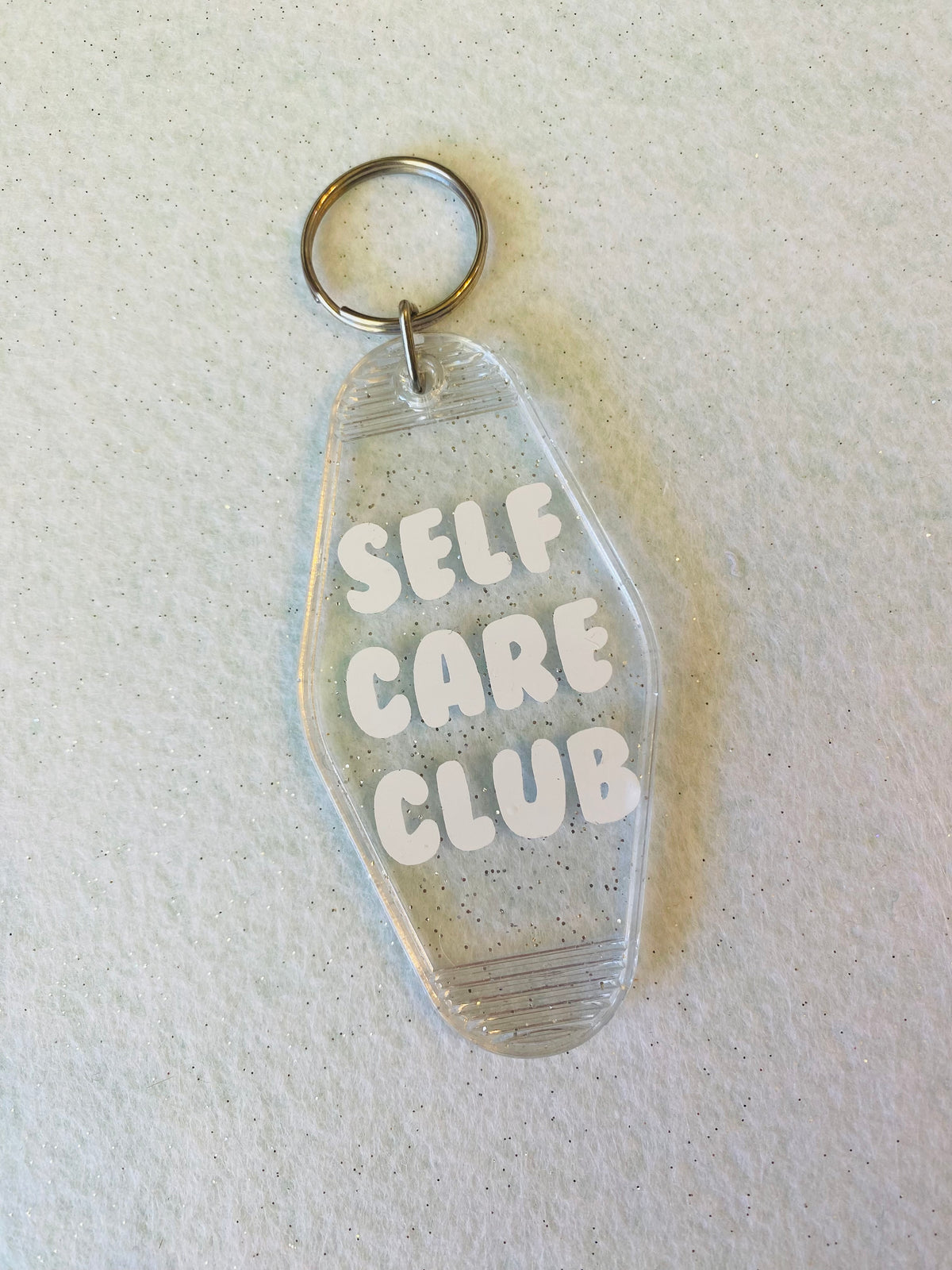 Self Care Club Clear Glitter Acrylic Motel Keychain